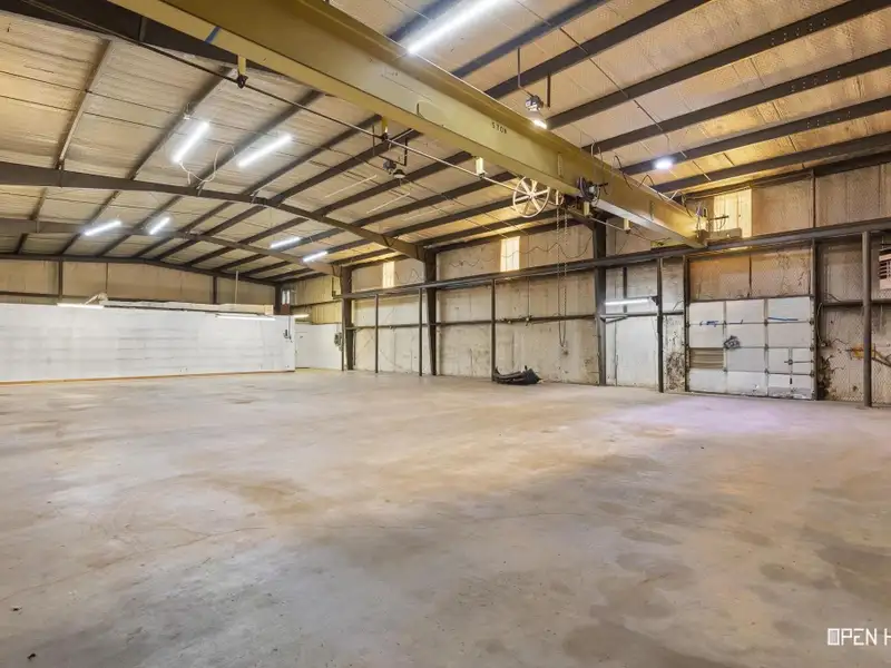 Insulated Warehouse and Office Space with Crane, Fenced Yard in Prime Location