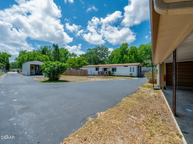 Mixed Use Property: Light Industrial Lot with Adjoining Residential Home and Expansion Potential