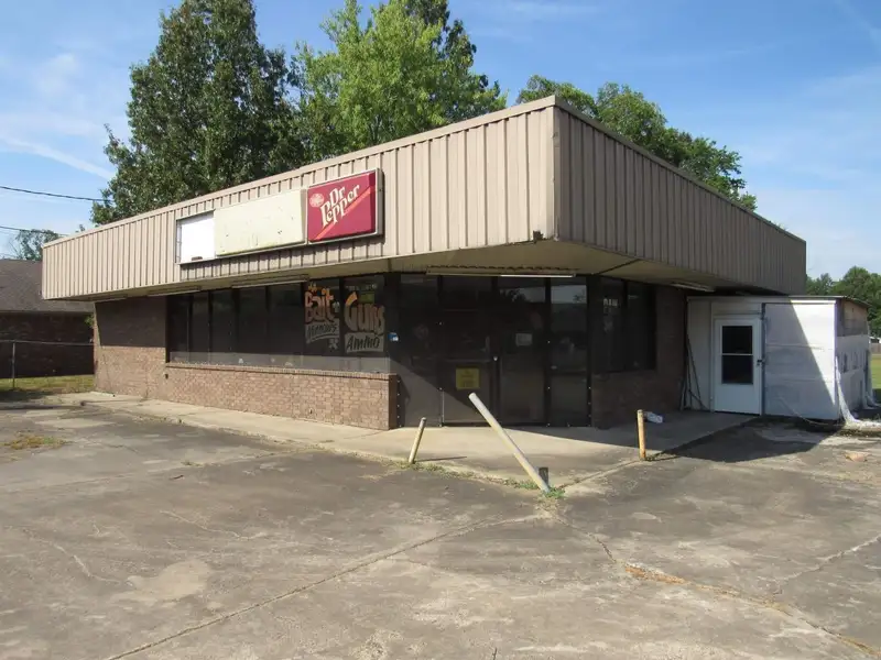 Versatile Commercial Property Near County Fair Grounds with Gas Station and Retail Potential