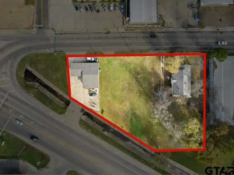 Prime Commercial Property with Building and Home on Half Acre Lot
