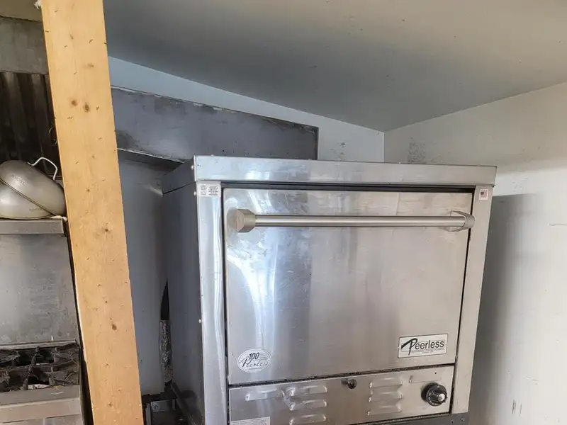 Investment Opportunity: Restaurant with Apartment and Additional Parking Near I-74