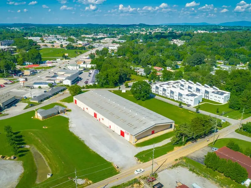 Versatile 33,880 Sf Industrial Warehouse with Income-producing Home in Cleveland, Tn