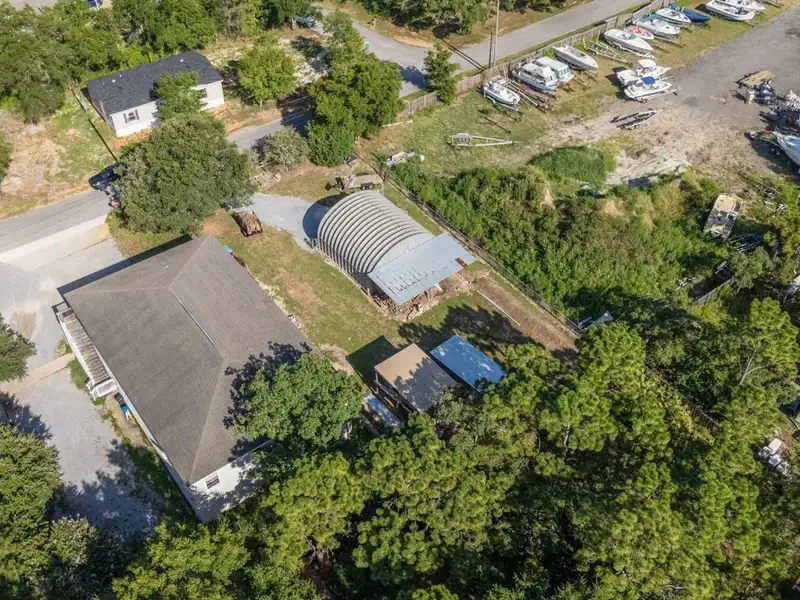 30x30 Enclosed Quonset Building with Pole Barn and Storage on Hwy 98