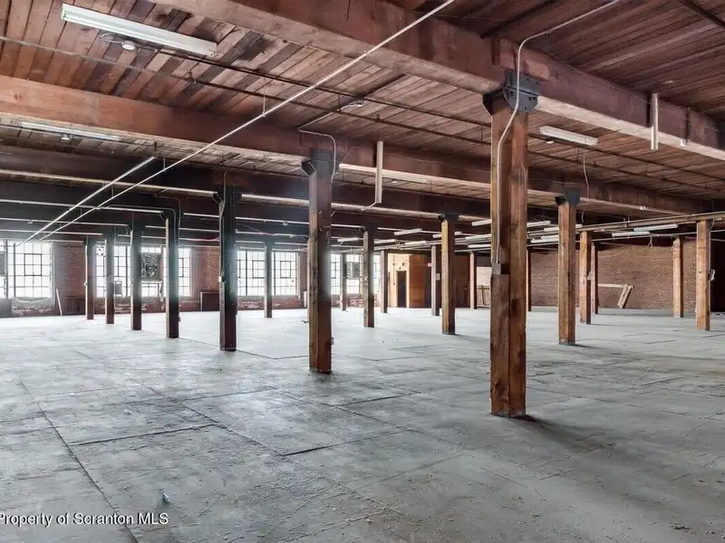 Four-story Commercial Property with Elevator Access and Basement in Prime Location