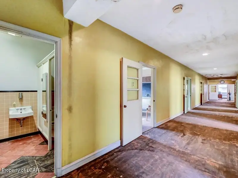 Versatile Downtown Hazleton Building: Former Worship Space with Offices/classrooms Potential