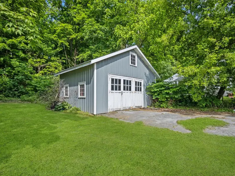 Commercial Retail/warehouse with Charming Colonial Home in High-traffic Corner Location