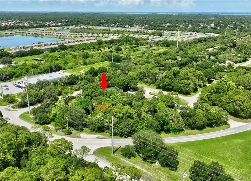 Commercial Corner Lot with Existing Residence in Lakewood Park, 31,140 Sq Ft