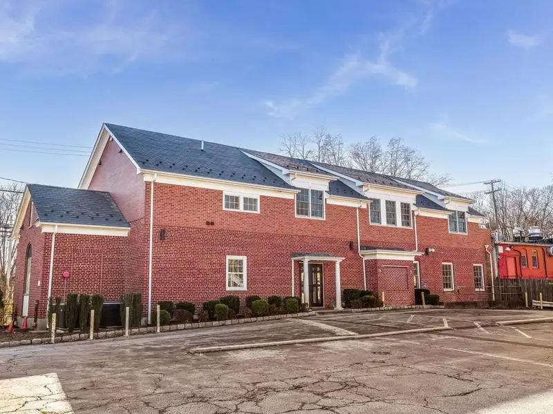 Versatile 9,428 Sq Ft Former Bank in B-2 Zone with Ample Parking and Expansion Potential