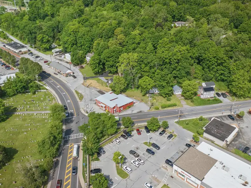 Commercial Retail/warehouse with Charming Colonial Home in High-traffic Corner Location