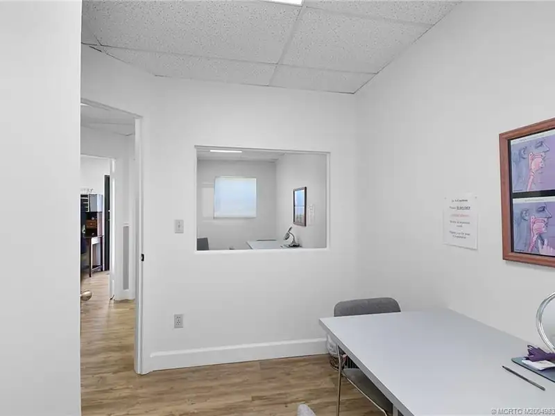 Versatile Office Building with Therapy Rooms and Break Area in R-3a Zoning