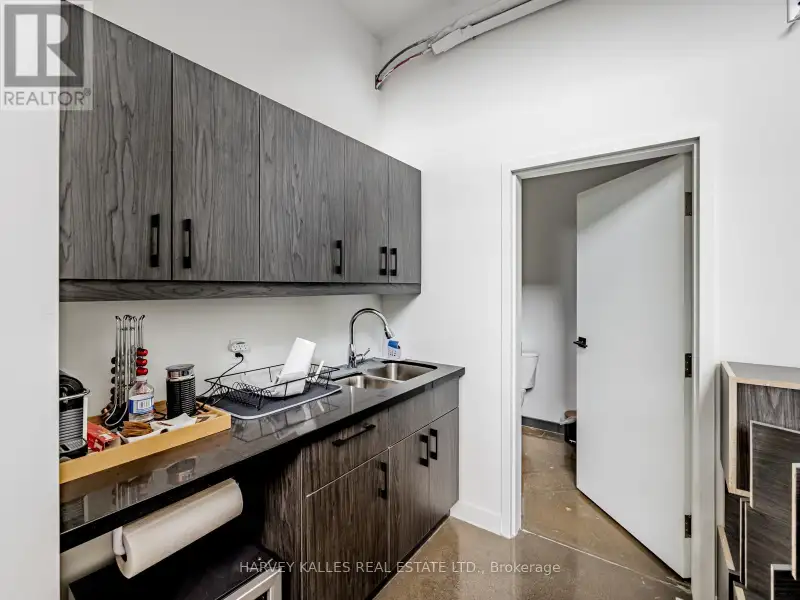 Fully Leased Commercial Condo in Prime Location on the Queensway