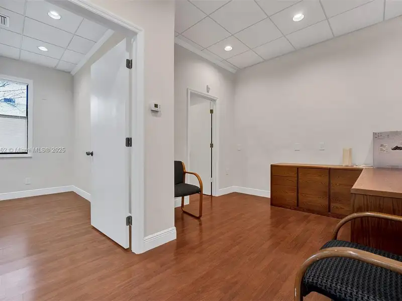 Renovated Office Building with 24 Surface Parking Spaces, On-site Management