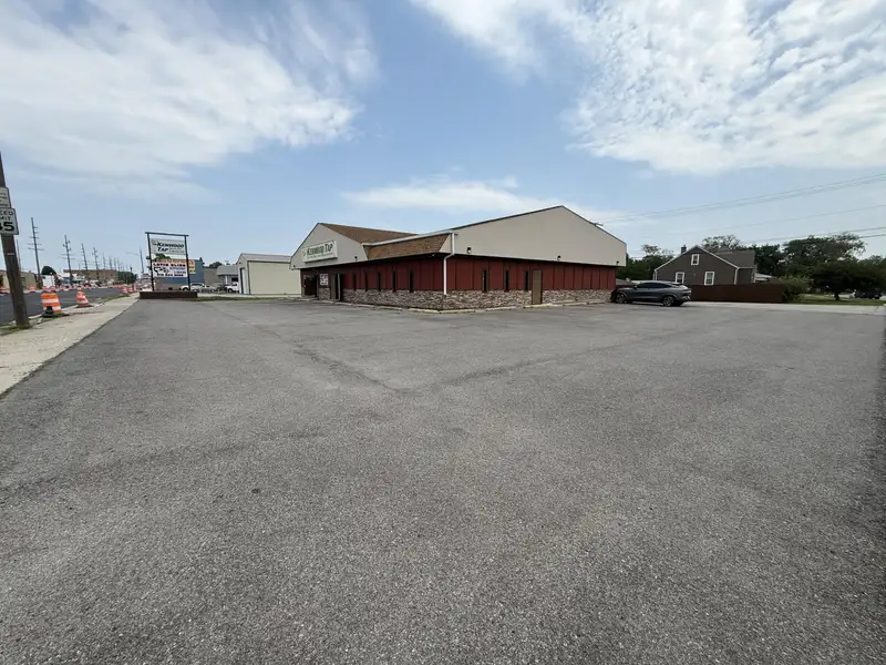 Turnkey Restaurant and Bar with Income-generating Tenants on Prime .62-acre Lot