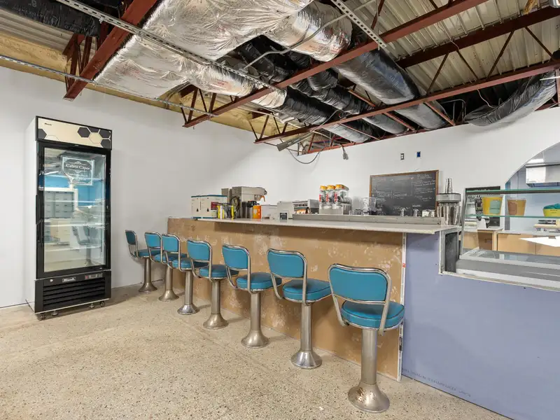 Versatile 3,240 Sf Commercial Building on E Michigan Ave with Kitchen Setup and Expansion Potential