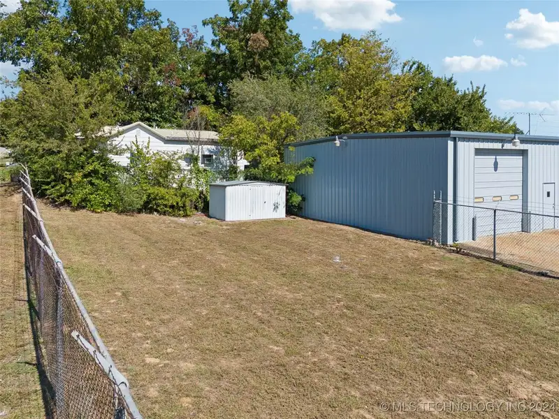 Versatile Former Machine Shop in Prime Downtown Sand Springs Location