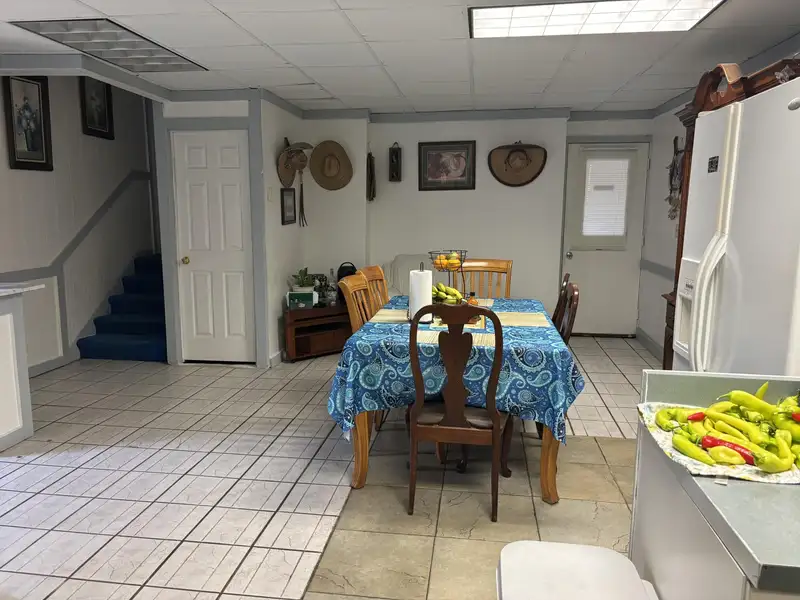 Mixed-use Property with 1-bedroom Apartment in Well-maintained Building