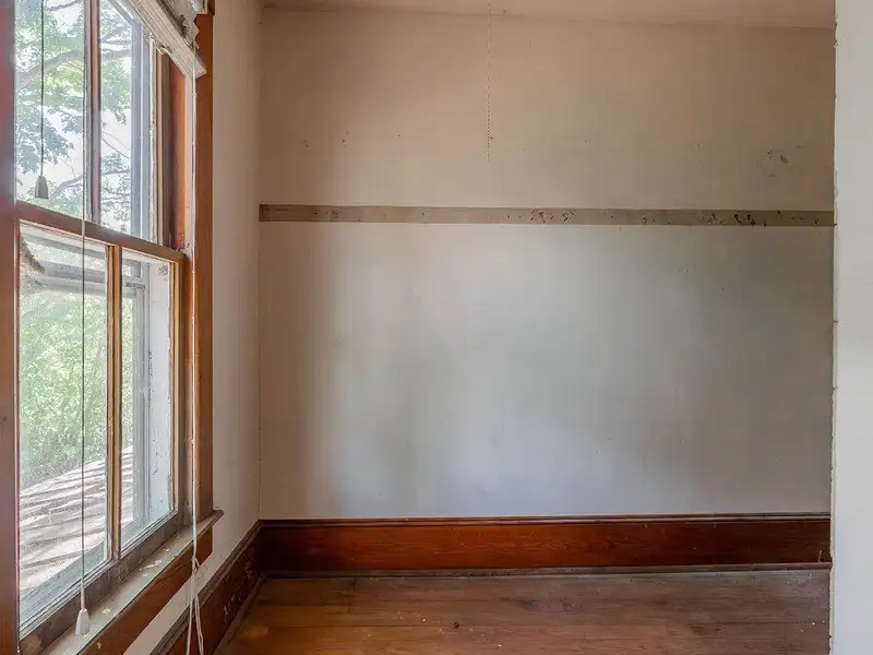Classic American Foursquare Home in Need of Restoration with Detached Garage