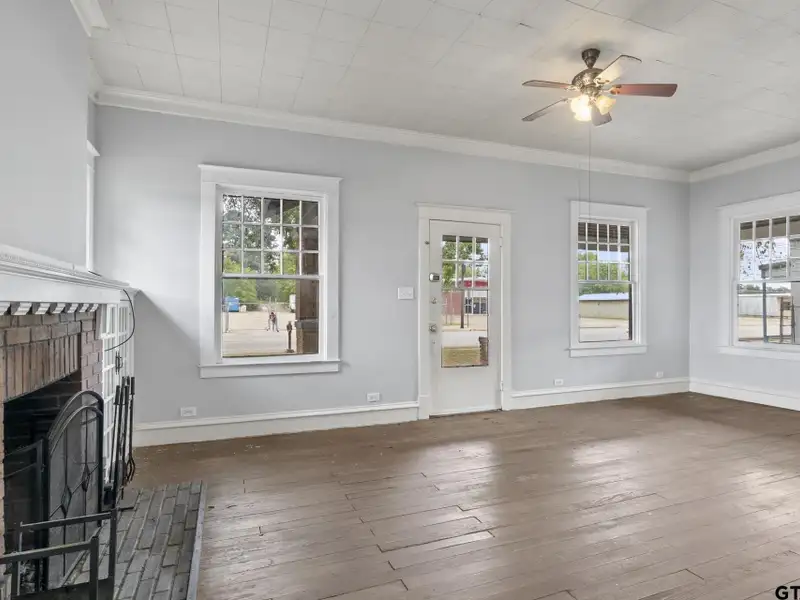 Prime Commercial Property with Building and Home on Half Acre Lot