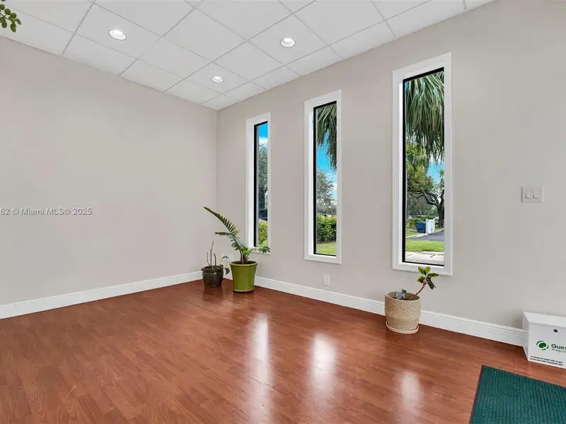 Renovated Office Building with 24 Surface Parking Spaces, On-site Management