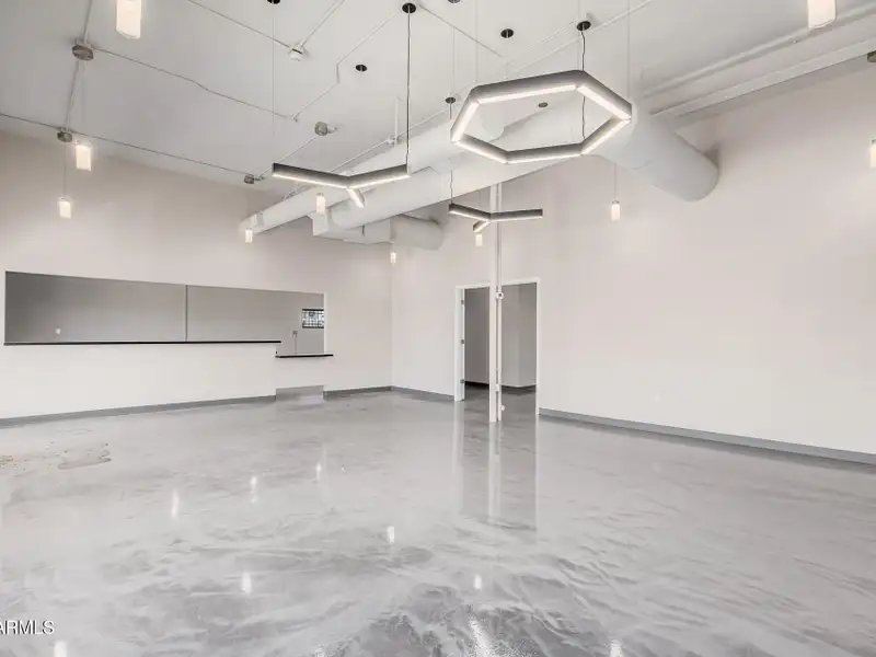 Versatile Commercial Property with Two Buildings and Ample Parking in Prime Location