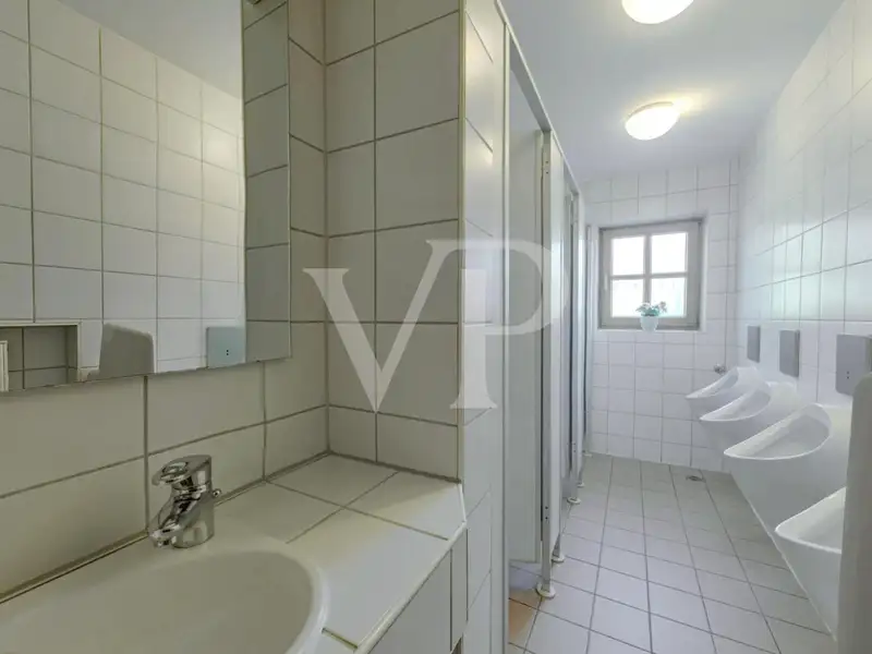 Versatile Residential and Commercial Building with Restaurant in Münchsmünster