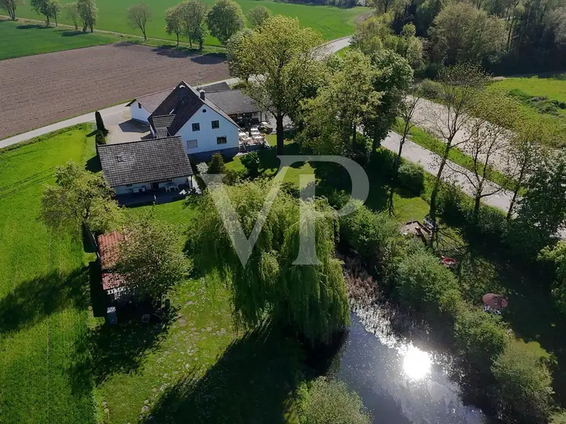 Versatile Residential and Commercial Building with Restaurant in Münchsmünster