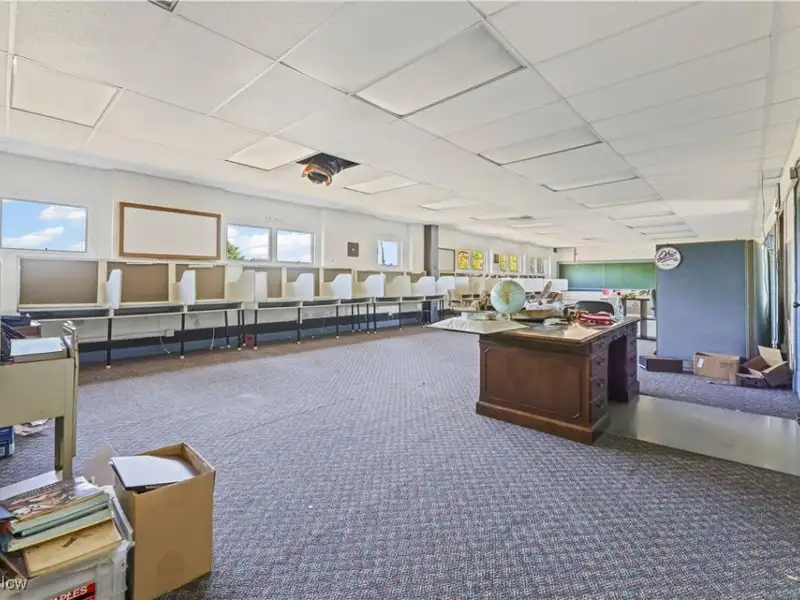 Versatile Two-story Brick Building on Almost 3 Acres with Gym and Classrooms
