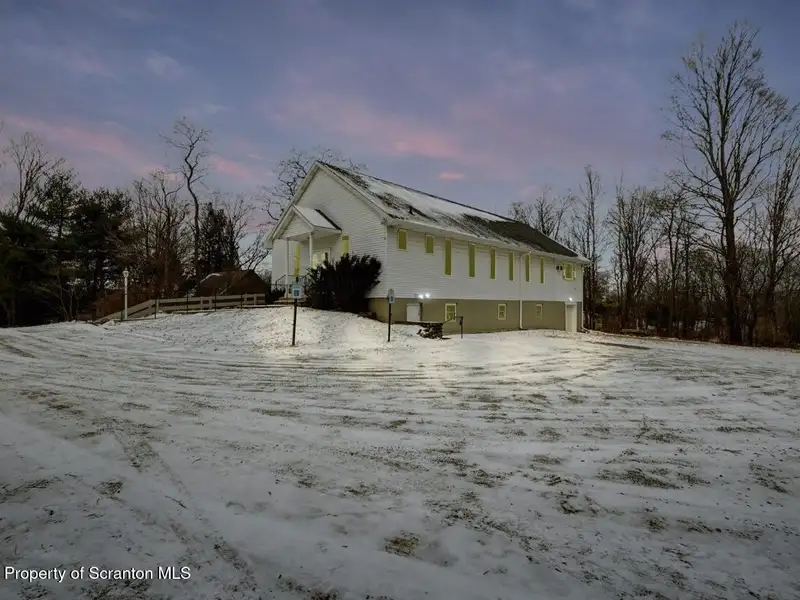Versatile Former Church Building in Peaceful Location with Ample Parking and Creative Potential