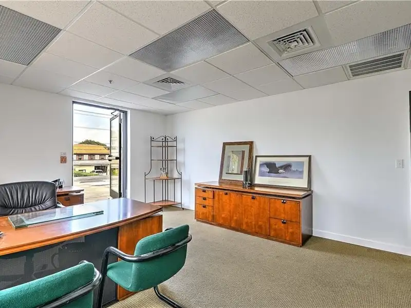 Versatile Multi-level Commercial Building with High Visibility on Major Corridor