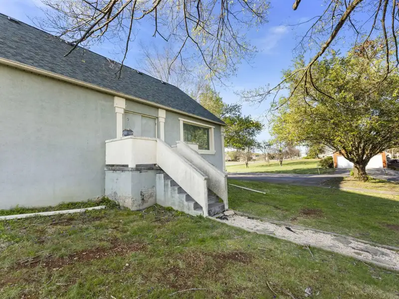 Versatile 4,305 Sq Ft Office Building with Apartment on Highway 11e