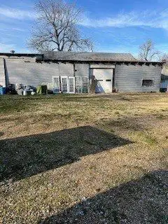 Large Steel Warehouse with Office and Residential Space, Potential for Subdivision