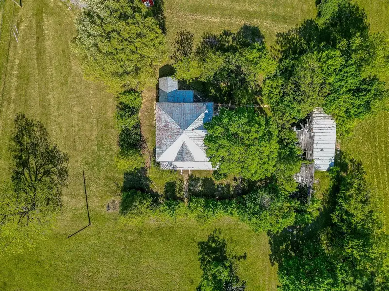 Classic American Foursquare Home in Need of Restoration with Detached Garage
