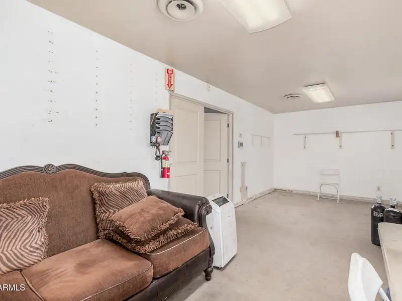 Versatile Commercial Property with Two Buildings and Ample Parking in Prime Location