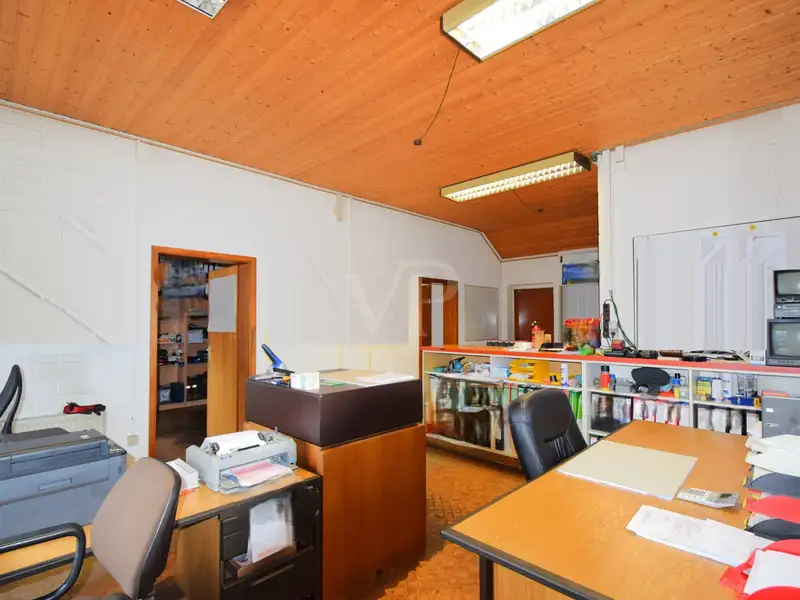 Versatile Industrial Property with Halls, Offices, and Open Space in Prime Location