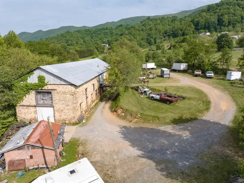 Historic 1918 Stone Building with 3.99 Acres and Detached Workshop in Balsam Road Area