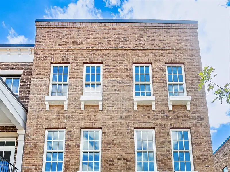 Live/work Townhome with Flex Space, Gourmet Kitchen, and 2-car Garage in Prime Location