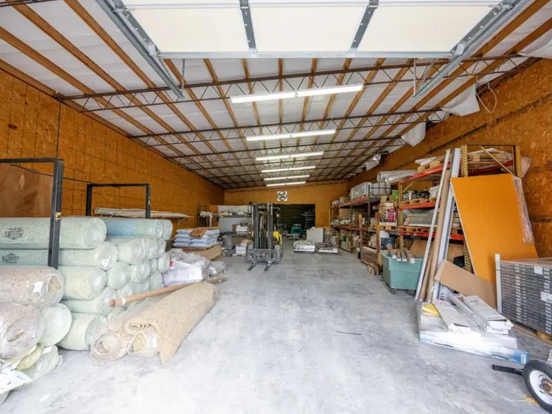 Large Commercial Building on Highway 412e in Parsons with Extensive Frontage and Warehouse Space