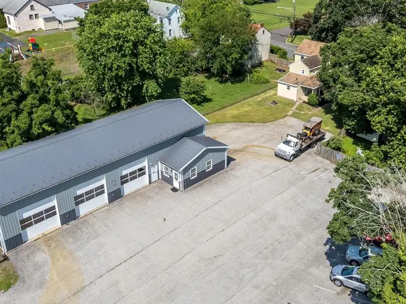 Auto Repair Shop with Residential Income Opportunity in Prime Location