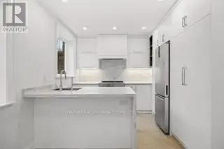 Renovated 2nd Floor Condo in Mid-town Toronto with Luxury Finishes and Modern Amenities