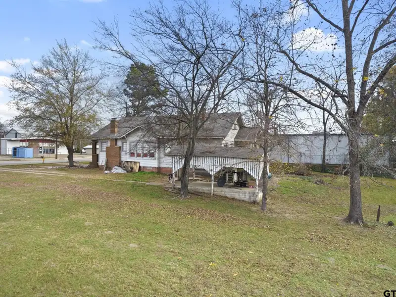 Prime Commercial Property with Building and Home on Half Acre Lot