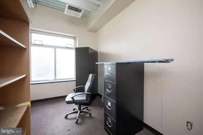 Versatile 6,000 Sq Ft Commercial Space in Prime Location with Parking Potential