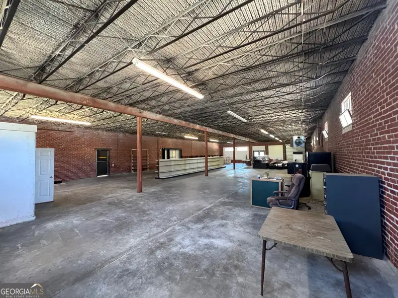 Versatile 5,000 Sq Ft Warehouse Near Downtown Gainesville with Dock and Roll-up Doors