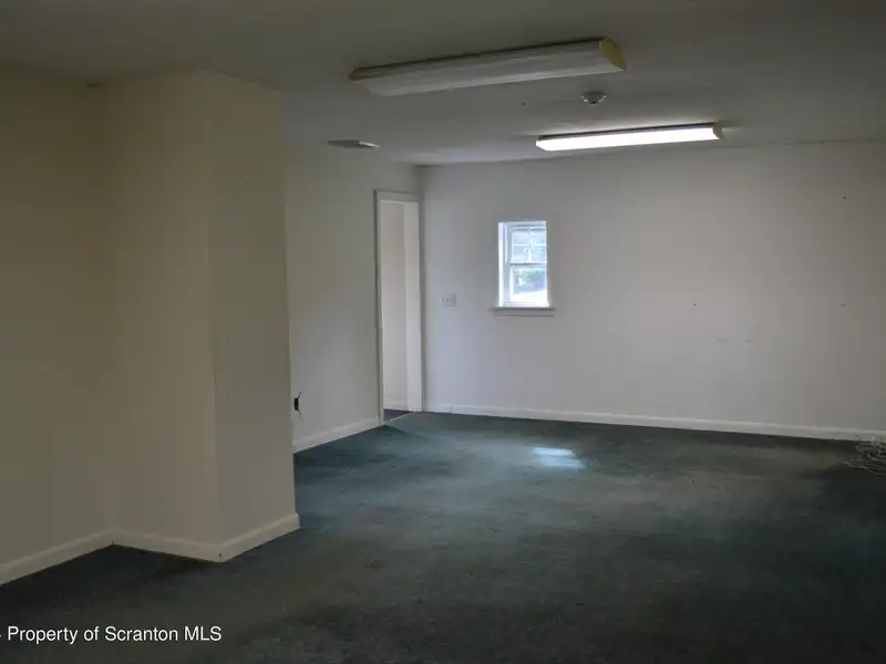Multi-use Building on 1.14 Acres with Prime Highway Commercial Zoning