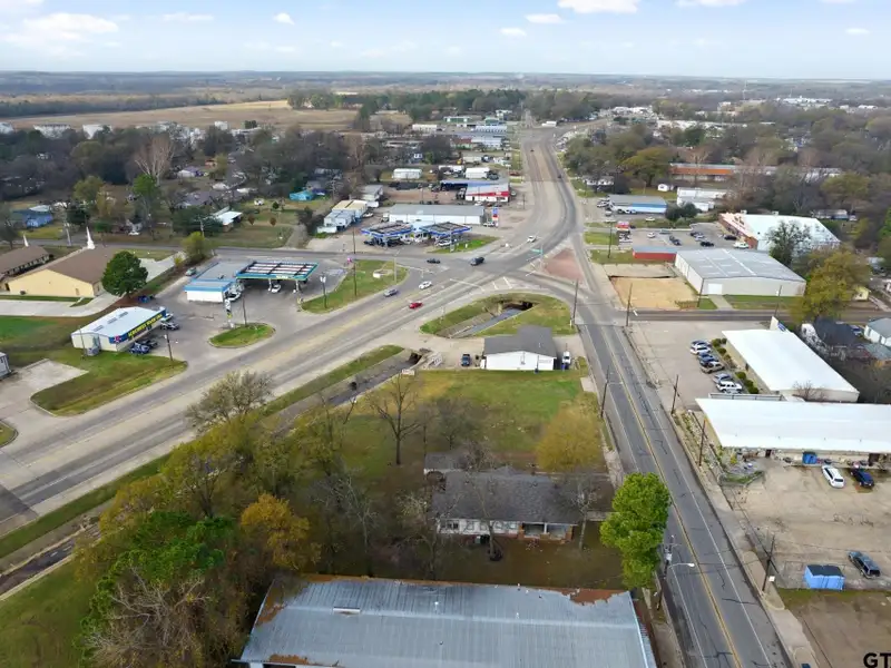 Prime Commercial Property with Building and Home on Half Acre Lot