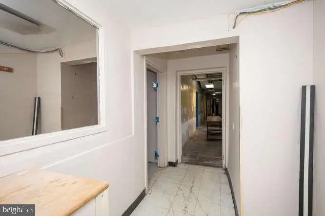 Versatile 6,000 Sq Ft Commercial Space in Prime Location with Parking Potential