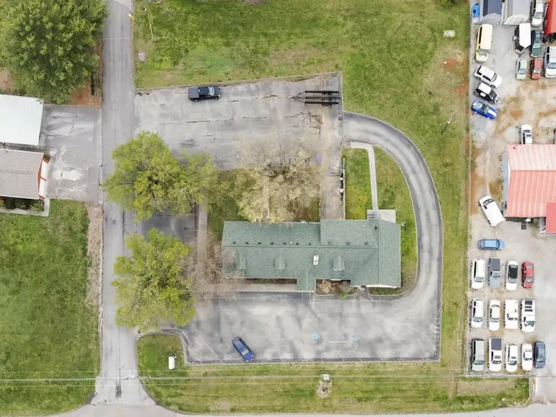 Versatile 4,305 Sq Ft Office Building with Apartment on Highway 11e