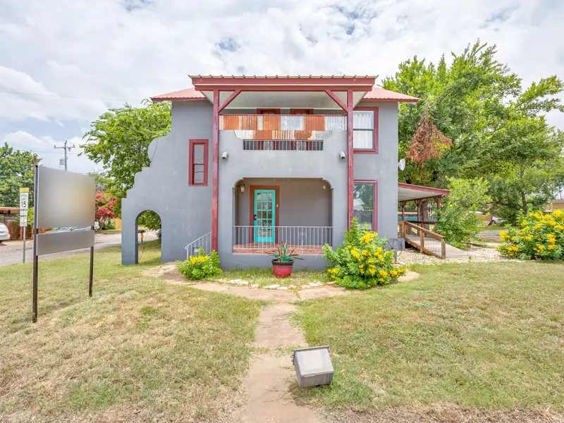 Historic Two-story Commercial Building with Garage Loft Apartment in Prime Location