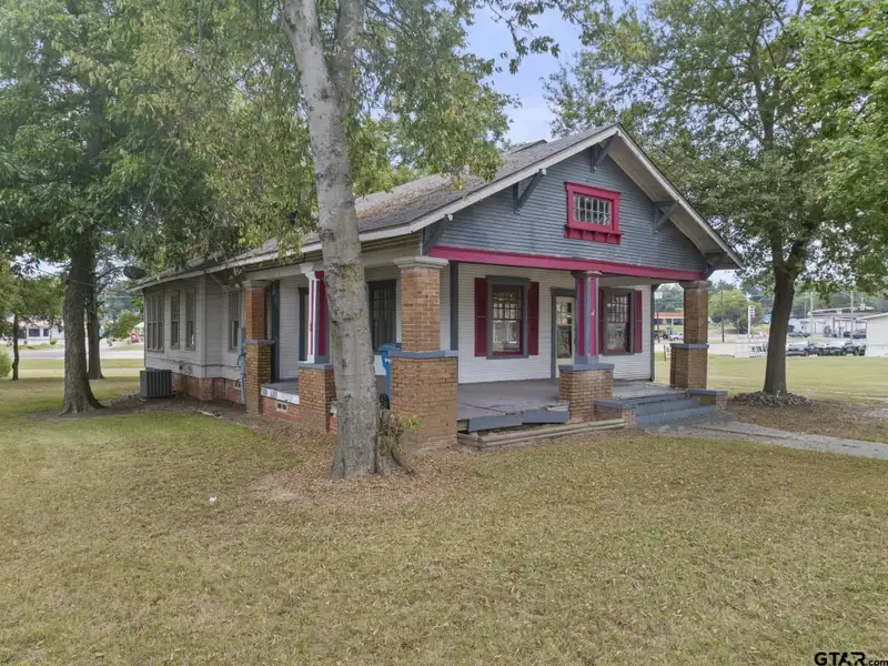 Prime Commercial Property with Building and Home on Half Acre Lot