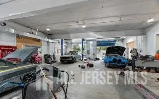 Turnkey Automotive Business with Car Dealership, Mechanic & Auto Body Shop in Prime Location