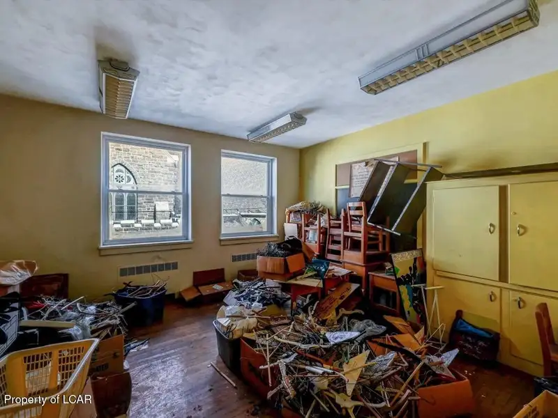 Versatile Downtown Hazleton Building: Former Worship Space with Offices/classrooms Potential